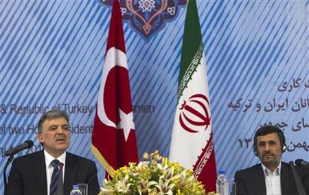 Turkey's President Gul speaks to Iranian and Turkish traders during an official meeting with his Iranian counterpart Ahmadinejad in Tehran