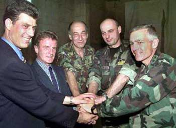 From left to right Hashim Thaci, UCK leader; Bernard Kouchner, UN Administrator of Kosovo; Gen. Sir Michael Jackson, KFOR Commander; Agim Ceku, Commander of KLA; Gen. Wesley Clark, NATO Commander. [Source Vojin Joksimovich]