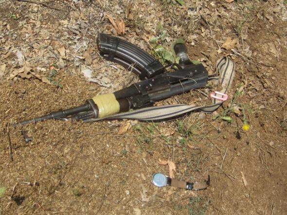 Το ΑΚ-47 και το ρολόι του.