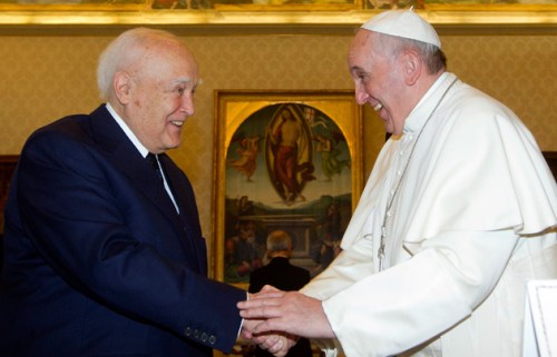 Pope Francis talks with Greece's President Karolos Papoulias during a private audience at the Vatican