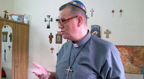 Canon-Andrew-White-side-Facebook