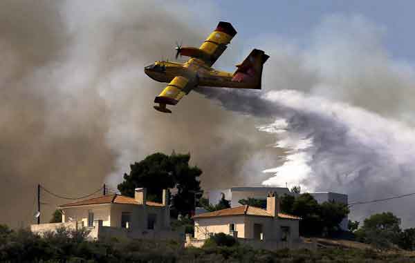 2015-07-20t174857z_1305570736_gf10000165172_rtrmadp_3_greece-fire-1